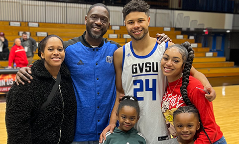 Family on basketball court 